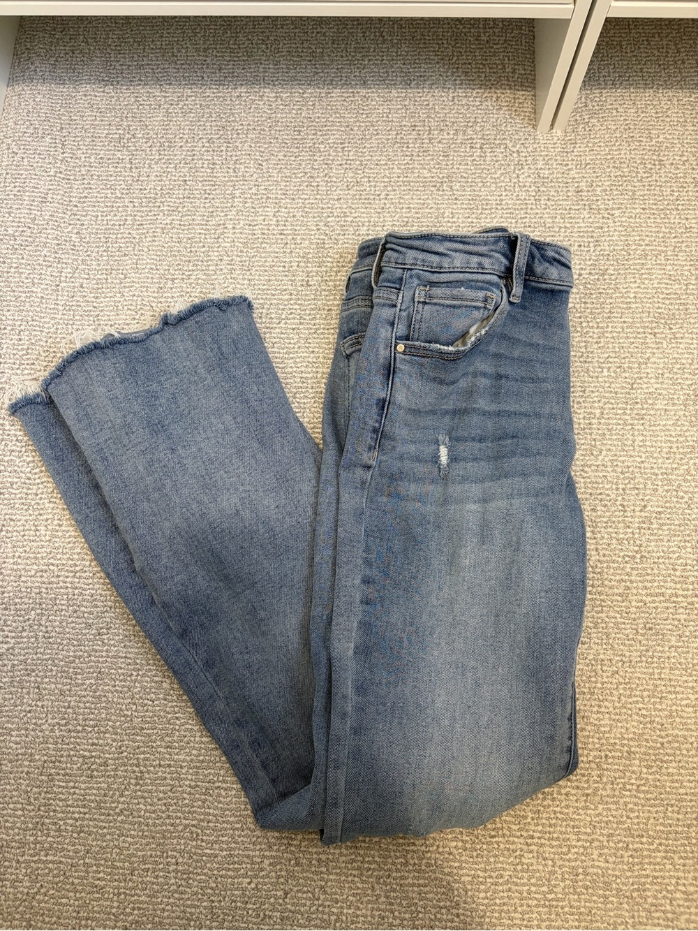 High-Rise Wide Leg Jeans with Frayed Hem in Light Blue